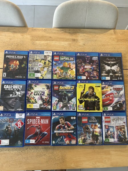 Playstation 4 (PS4) 1TB Console, 3 Controller, Charging dock, 15 games Carousel 5