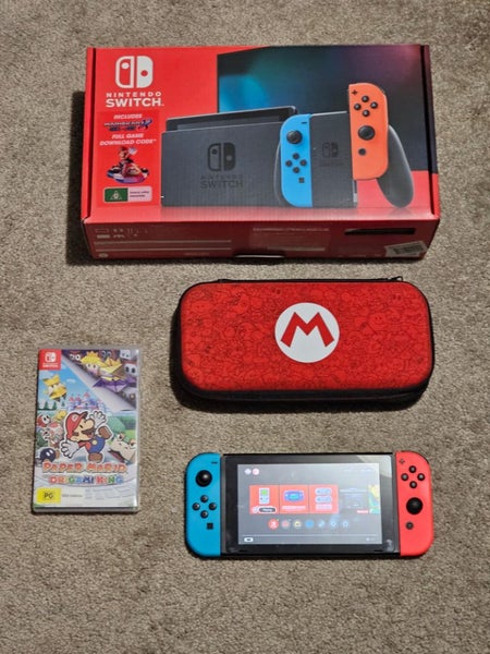 Nintendo switch console, paper mario & case Carousel 1