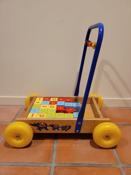 Kids push along Trolley with blocks Carousel 1