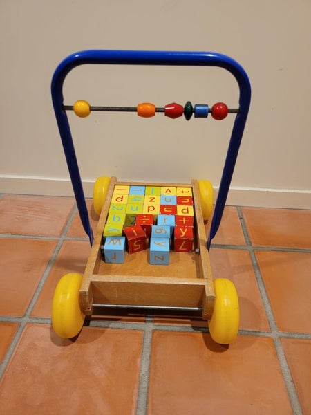 Kids push along Trolley with blocks Carousel 3