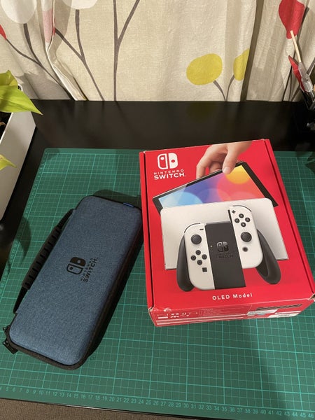 Nintendo Switch OLED Dock set + Case Carousel 1