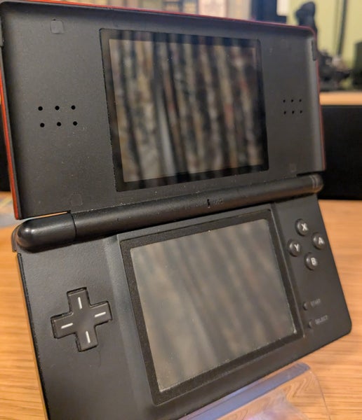 Nintendo DS Lite + Pokémon Mystery Dungeon + Mario & Sonic at the Olympic Games Carousel 2