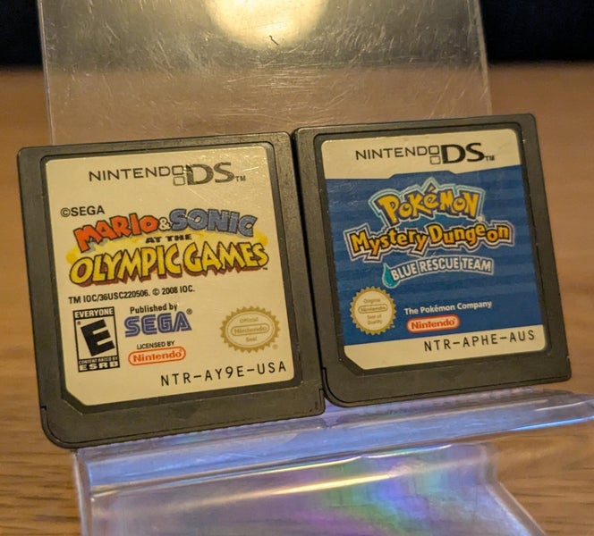 Nintendo DS Lite + Pokémon Mystery Dungeon + Mario & Sonic at the Olympic Games Carousel 6