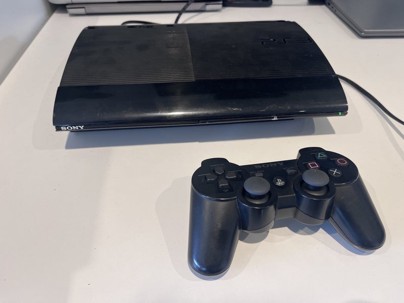PlayStation 3 (PS3) Console + 10 Games & Controller – Great Condition! Carousel 7