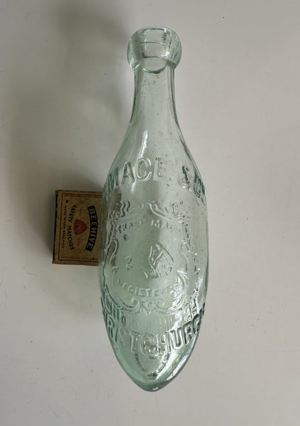 H Mace & co Christchurch glass torpedo bottle Carousel 1