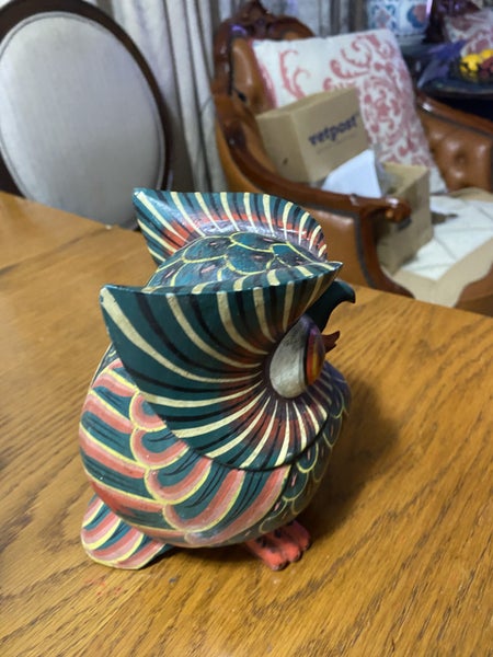A beautiful wood carved owl with good painting. Carousel 2