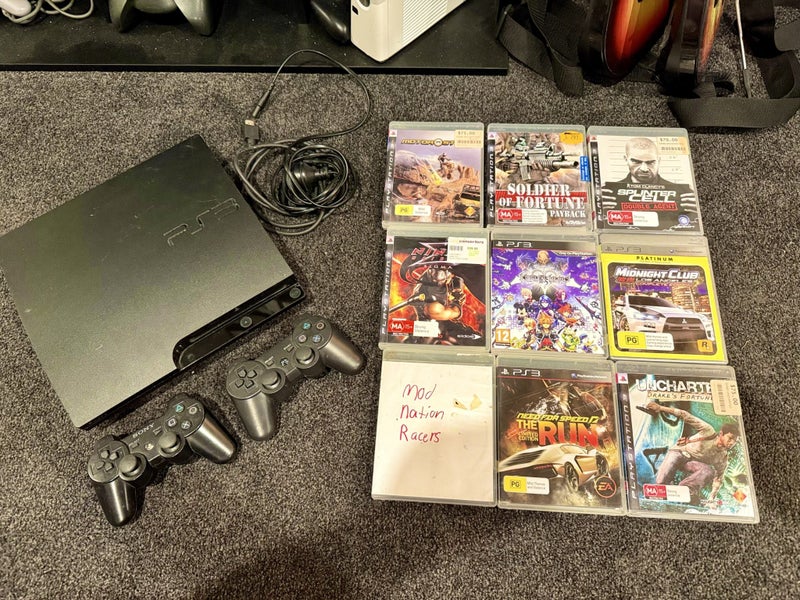 PS3 Slim 160GB + 9 Games 2 Controllers Carousel 1