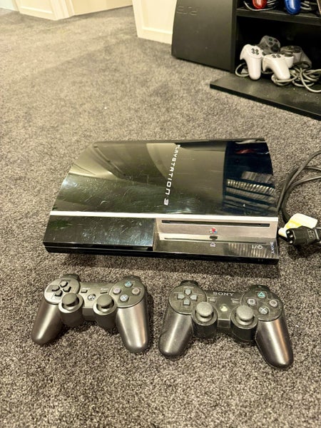 PS3 Fat 40GB + 9 Games 2 controllers Carousel 2
