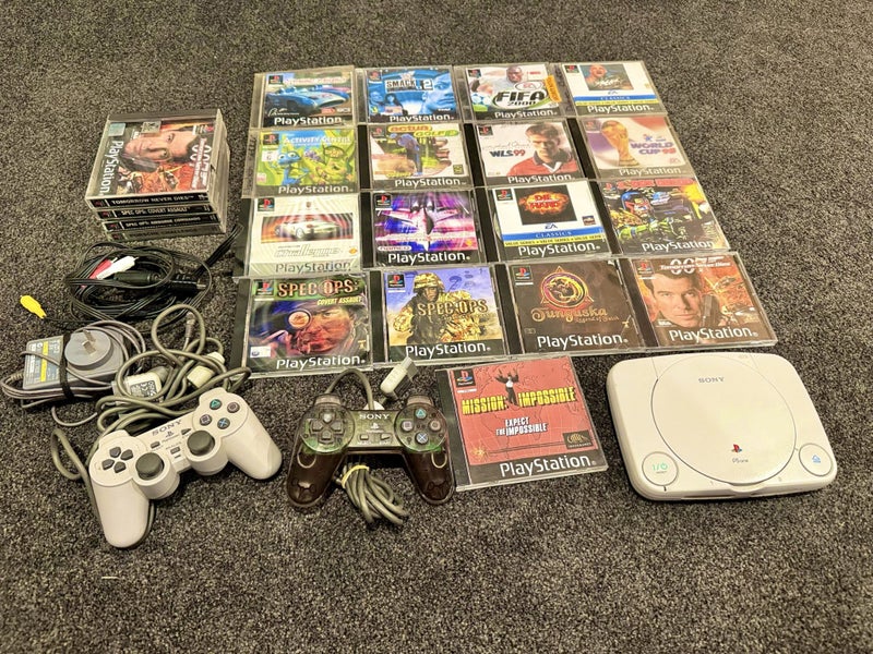 PSOne console + 17 Games 2 controllers Carousel 1