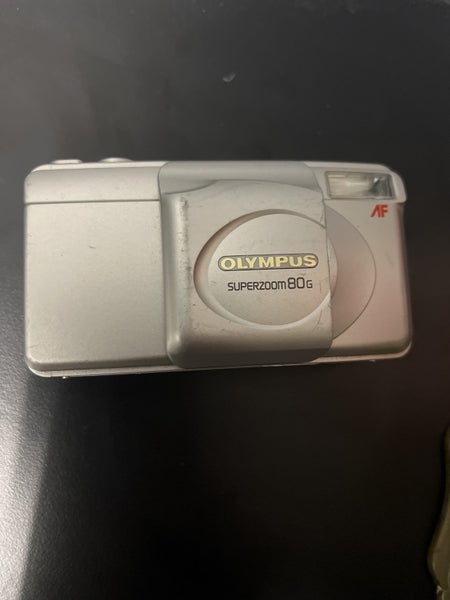 Olympus Superzomm 80s film camera Carousel 1