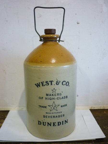 DUNEDIN WEST + Co ORIGINAL STONEWARE JAR.WITH STOPPER + HANDLE Carousel 1