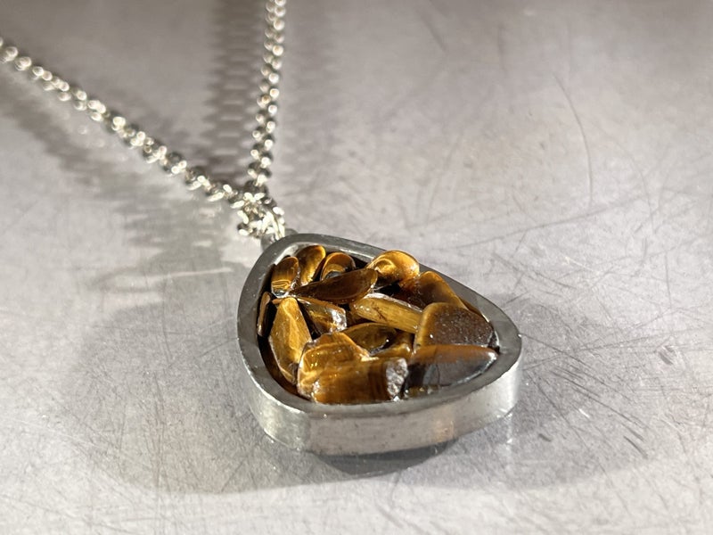 Mid-Century Jørgen Jensen Pewter and Tiger's Eye Pendant Carousel 1