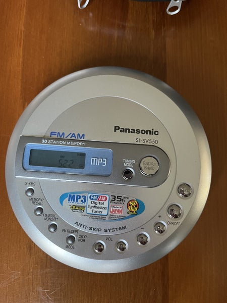 Panasonic Portable CD player/Radio with bag also Sennheiser Headphone Carousel 1