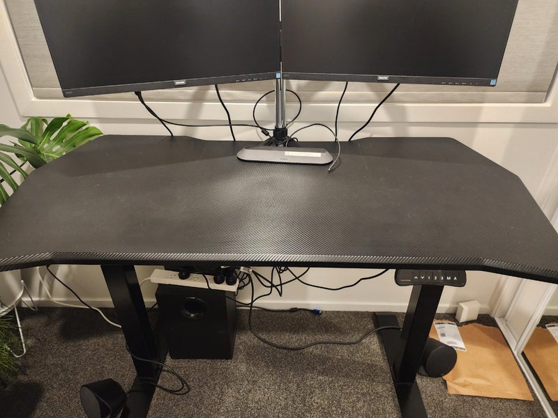 $1 Reserve Loctek gaming table Carousel 1
