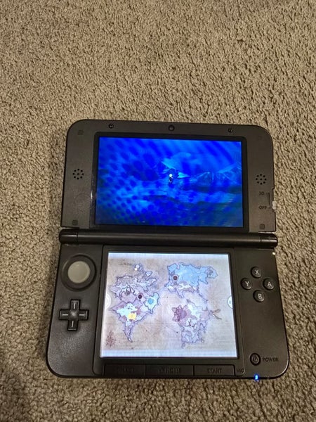 Nintendo 3DS XL + Charger Carousel 10