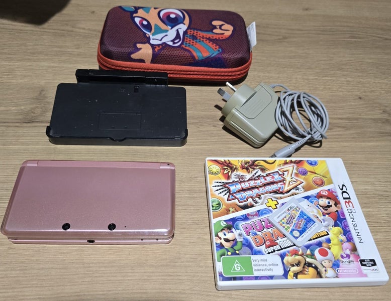 Nintendo 3DS Metallic Pink Console & Puzzle Dragon Super Mario Edition Game Carousel 1