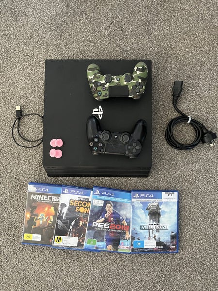 PS4 Pro 1TB, two controllers and games Carousel 1