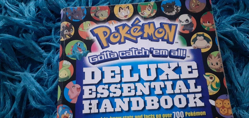 $1 RES 2015 Nintendo Pokemon Deluxe Essential Handbook Carousel 2