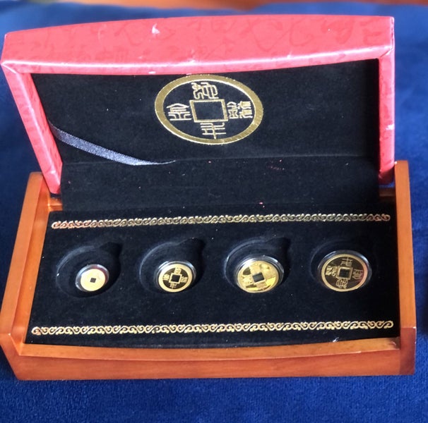 Gold coin collector’s boxed set Carousel 1
