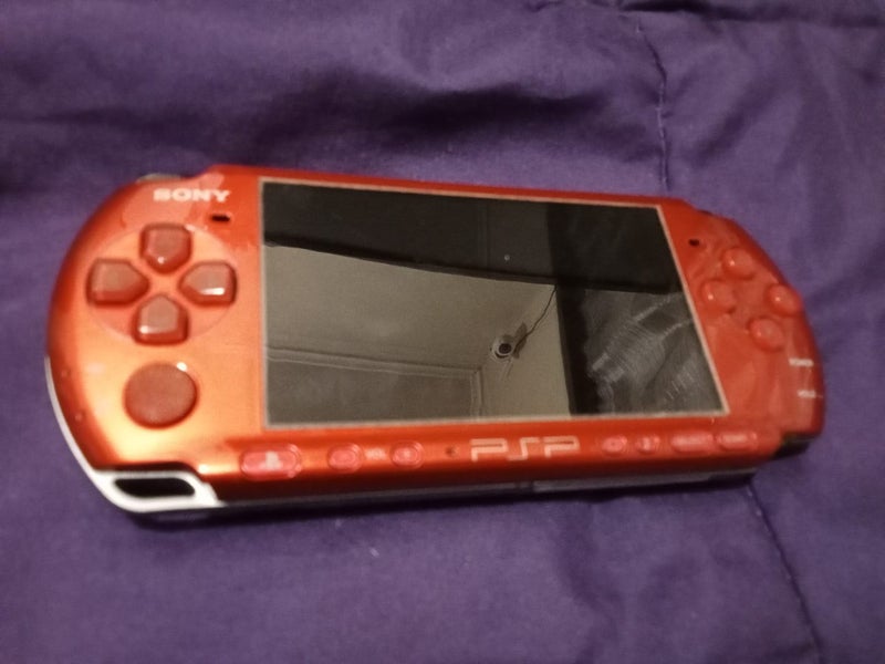 Red PSP with lots of games Carousel 2