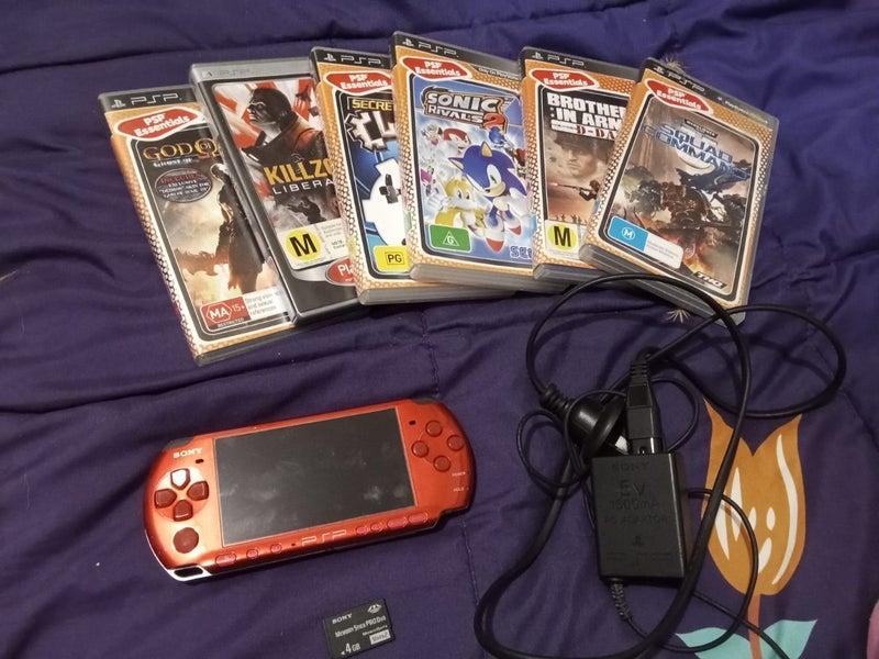 Red PSP with lots of games Carousel 1
