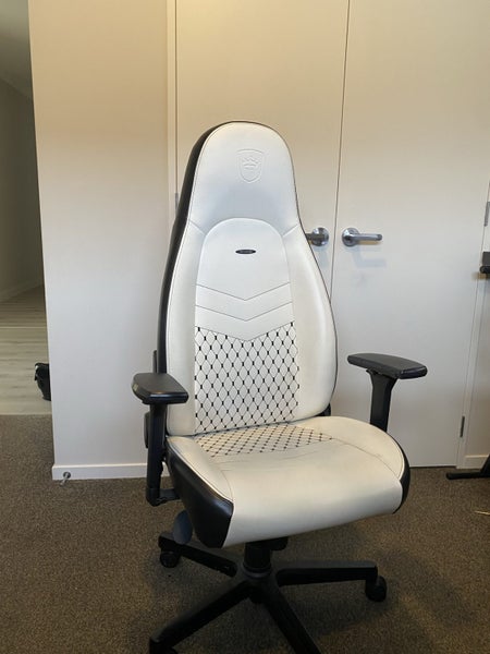 As new Noble chairs ICON series white and black Carousel 1