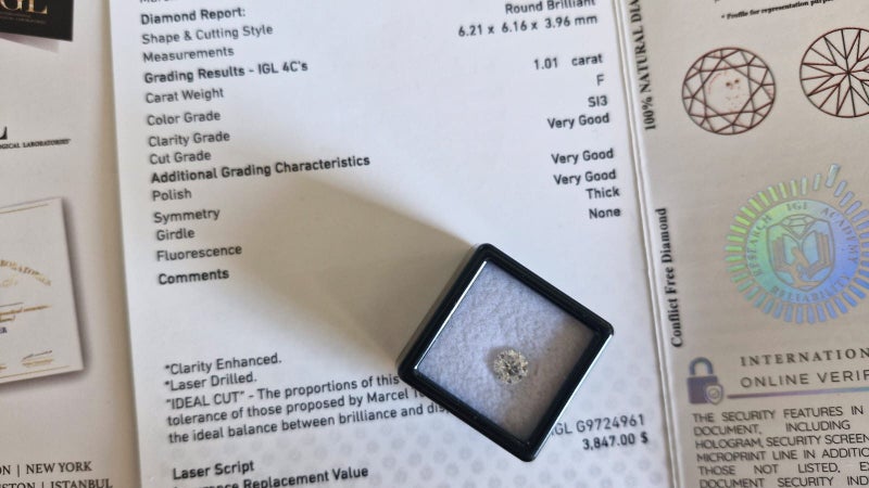 $1 RES * Valuation $6,515.00 * 1.01ct Round Large White Diamond Loose IGL CERT Carousel 1