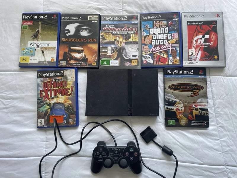 PS2 Slim console controller & games Carousel 1