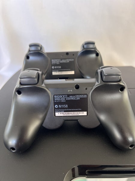 x1 320GB Playstation PS3 Slim w/ x2 Sony wireless Dualshock3 controllers Carousel 14