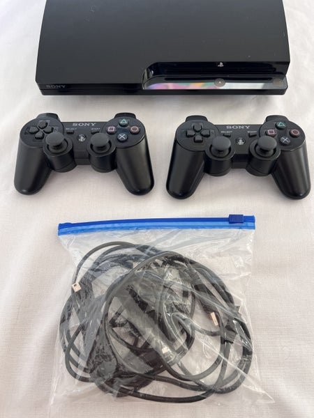 x1 320GB Playstation PS3 Slim w/ x2 Sony wireless Dualshock3 controllers Carousel 2