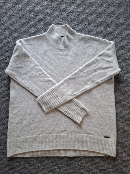 Decjuba Knitted Jersey Carousel 1