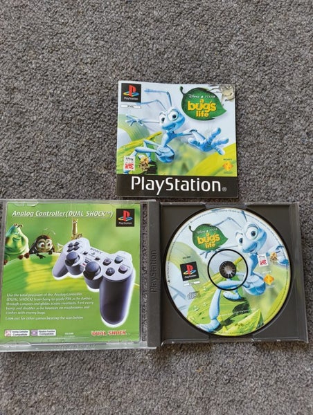 Playstation 1 console with Croc and Bugs life Carousel 9
