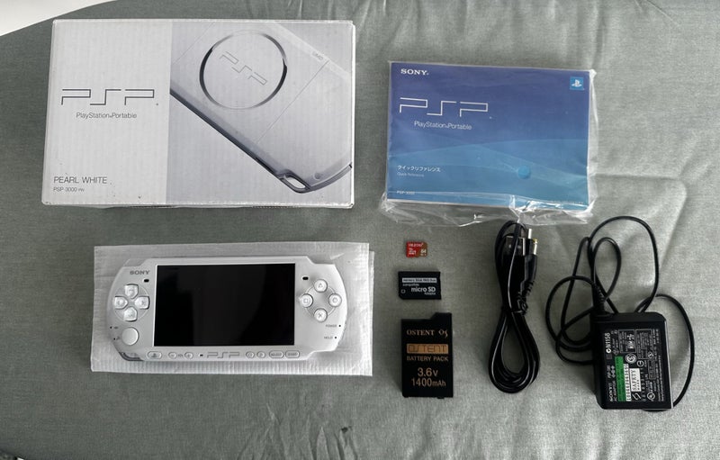 PlayStation Portable (PSP) 3000 – Pearl White | 64GB | Open Boxed | Fully Setup Carousel 1