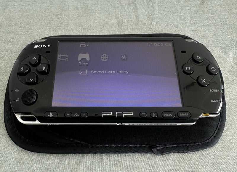 PlayStation Portable (PSP) 3000 – Piano Black | 64GB | Fully Set Up Carousel 2