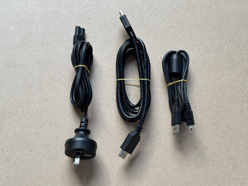 PlayStation 3 with cables and controller Carousel 2