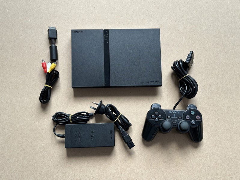 PlayStation 2 slim with Controller Carousel 1