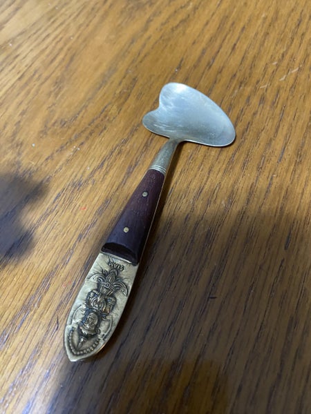An old lovely solid brass spoon. Carousel 1