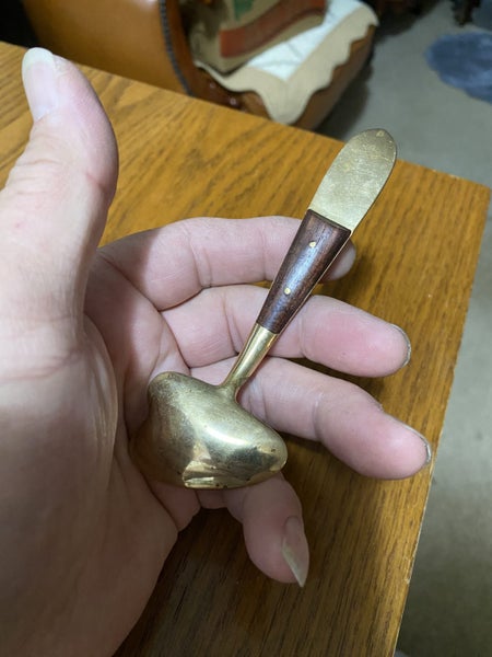 An old lovely solid brass spoon. Carousel 9