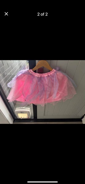 2 ballerina skirts .Fit a 5 -6 year old. Carousel 1