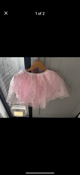 2 ballerina skirts .Fit a 5 -6 year old. Carousel 2