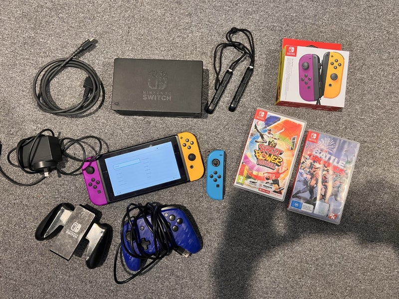 Nintendo Switch with games and accessories Carousel 1