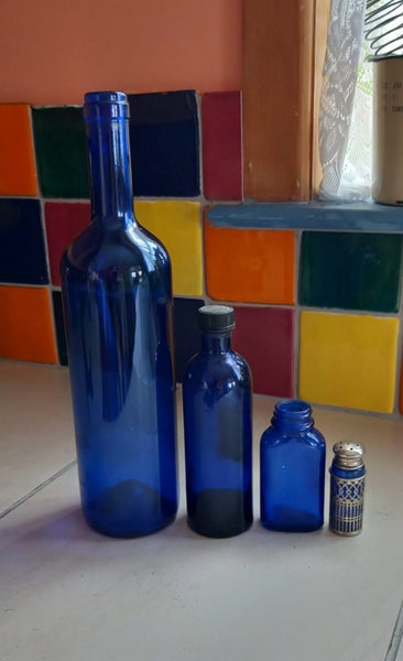 4 x Vintage Blue Glass BOttles Carousel 9