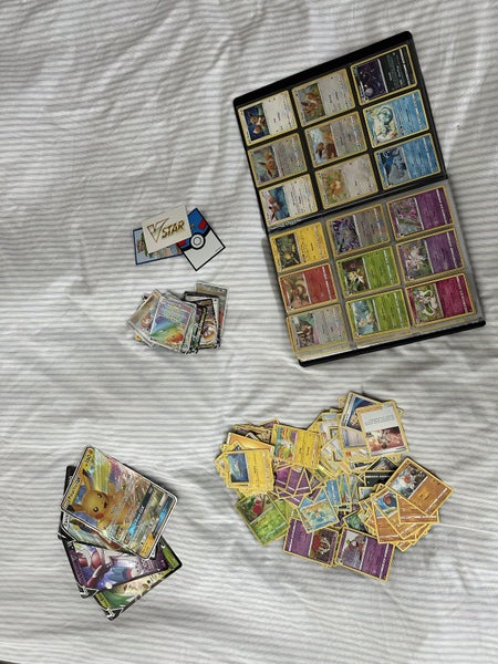Whole book of Pokémon cards plus more Carousel 1