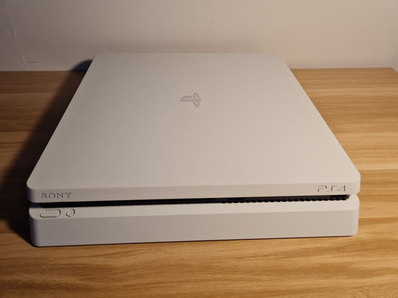 Playstation 4 Console Slimline 500GB + 2x Controllers + 3x Games Carousel 1