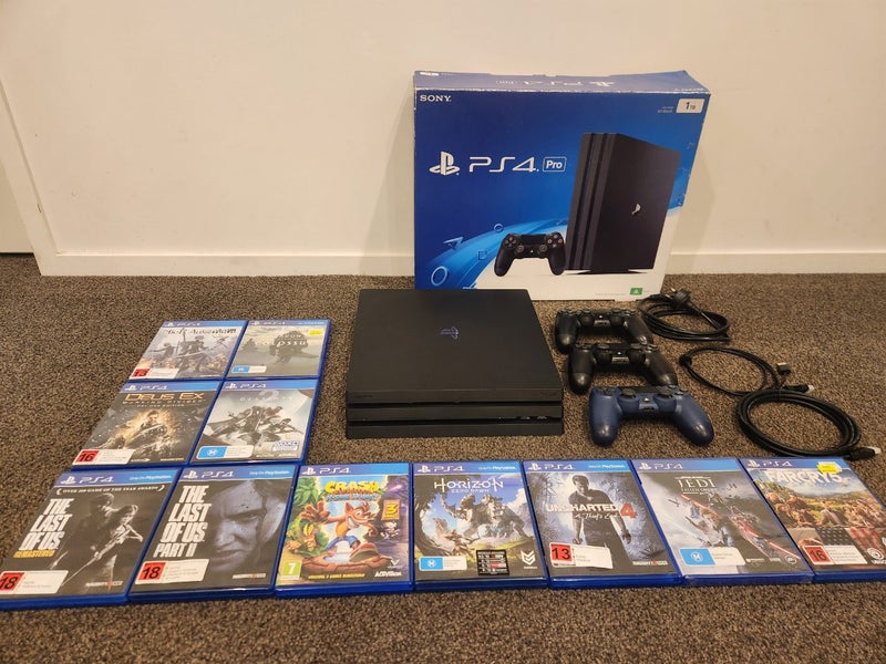 PS4 Pro 1TB + 11 Games + 3 Controllers Carousel 1