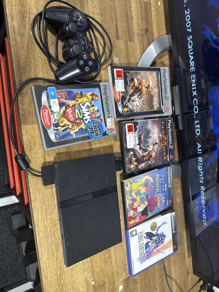 PlayStation 2 Slim, Controller and Games Carousel 2