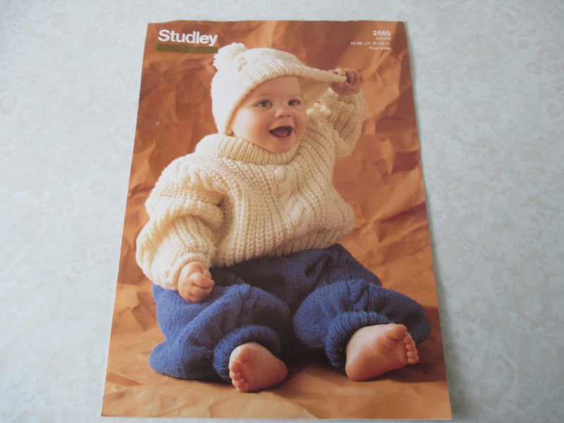 Baby Knitting Pattern - Sweaters, Trousers and Hat Carousel 1