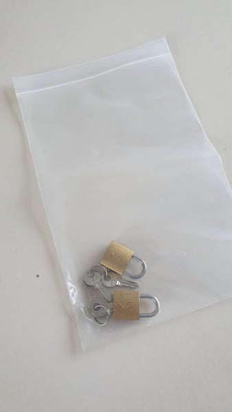 PAIR OF SMALL PADLOCKS & 4 KEYS. Happy Bidding!! Carousel 2