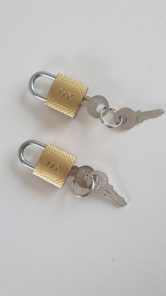 PAIR OF SMALL PADLOCKS & 4 KEYS. Happy Bidding!! Carousel 1