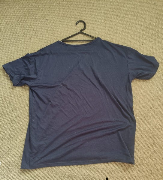 Shirt saying Whatever on it. Carousel 2